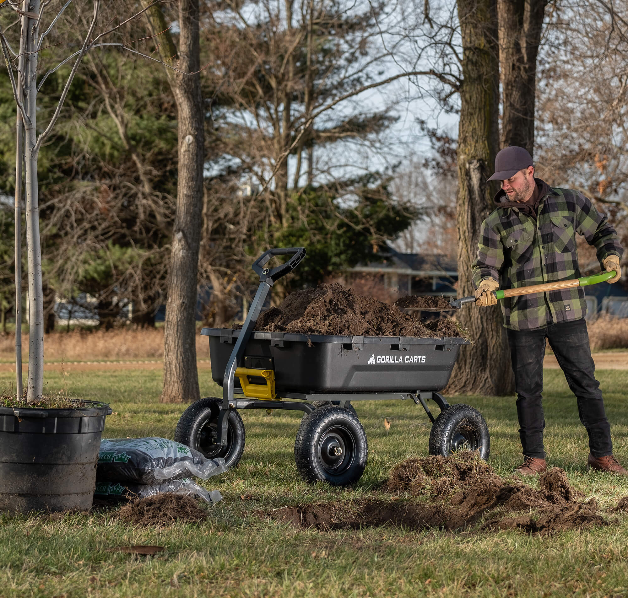 man shoveling dirt in a GCG-12