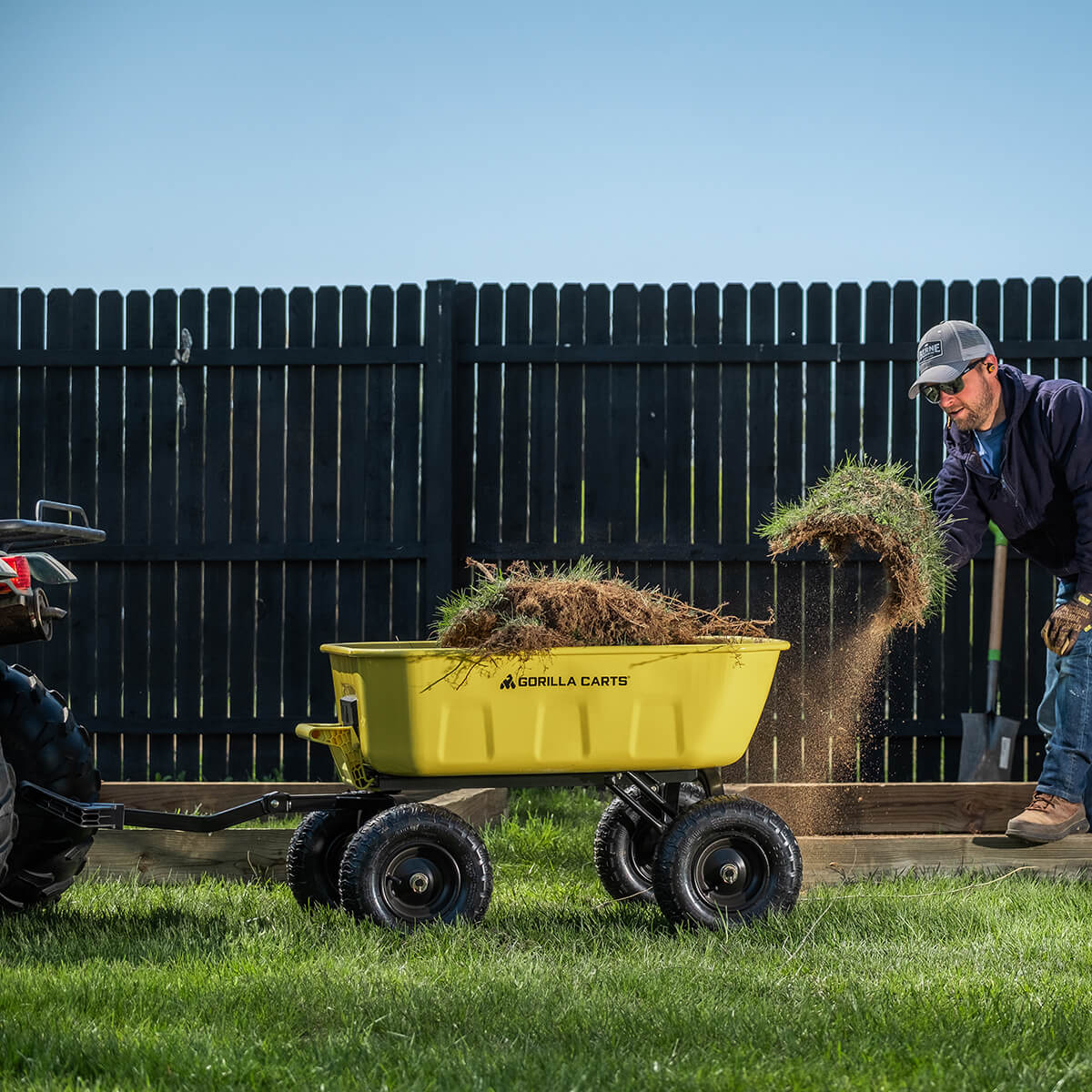 man grabbing grass from a GCSD-8